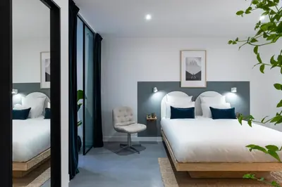 Un ou plusieurs lits dans un hébergement de l'établissement Baba Hotel