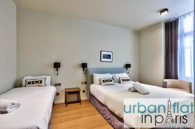 Un ou plusieurs lits dans un hébergement de l'établissement 138 - Urban Beautiful Duplex in Saint Germain