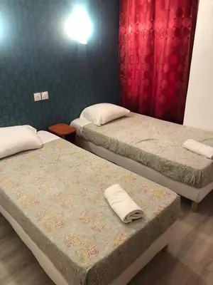 Un ou plusieurs lits dans un hébergement de l'établissement Hôtel Central Bastille