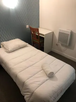 Un ou plusieurs lits dans un hébergement de l'établissement Hôtel Central Bastille