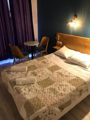 Un ou plusieurs lits dans un hébergement de l'établissement Hôtel Central Bastille