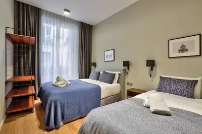 Un ou plusieurs lits dans un hébergement de l'établissement 140 - Urban Duplex near Saint-Germain des Pres