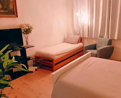 Un ou plusieurs lits dans un hébergement de l'établissement Studio accueillant au cœur de Paris - 30 m² - Tout inclus.
