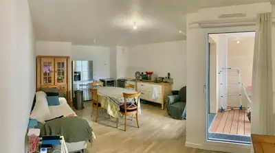 Coin salon dans l'établissement Chambre privée