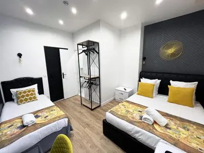 Un ou plusieurs lits dans un hébergement de l'établissement UrbanFlat 157 - Urban Coco Flat in Montorgueil