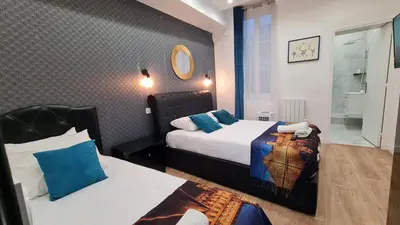 Un ou plusieurs lits dans un hébergement de l'établissement UrbanFlat 157 - Urban Coco Flat in Montorgueil