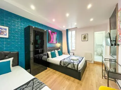 Un ou plusieurs lits dans un hébergement de l'établissement UrbanFlat 158 - Louis Flat in Montorgueil