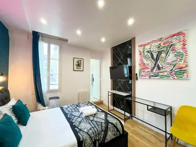 Un ou plusieurs lits dans un hébergement de l'établissement UrbanFlat 158 - Louis Flat in Montorgueil