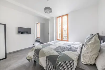 Télévision ou salle de divertissement dans l'établissement Appartement Montparnasse