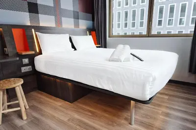 Un ou plusieurs lits dans un hébergement de l'établissement easyHotel Paris Nord Aubervilliers
