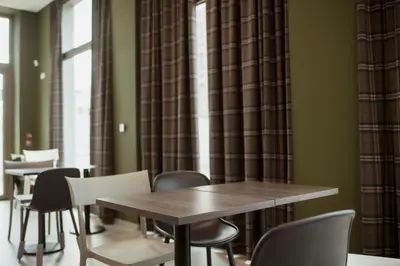 Coin salon dans l'établissement easyHotel Paris Nord Aubervilliers