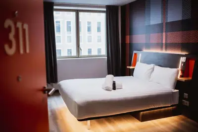 Un ou plusieurs lits dans un hébergement de l'établissement easyHotel Paris Nord Aubervilliers