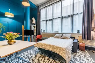 Un ou plusieurs lits dans un hébergement de l'établissement Mon loft