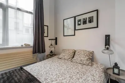 Un ou plusieurs lits dans un hébergement de l'établissement Mon loft