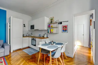 Cuisine ou kitchenette dans l'établissement Appartement Fragonard - Welkeys