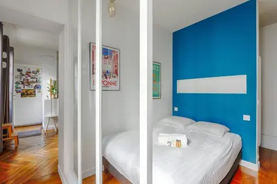 Un ou plusieurs lits dans un hébergement de l'établissement Appartement Fragonard - Welkeys