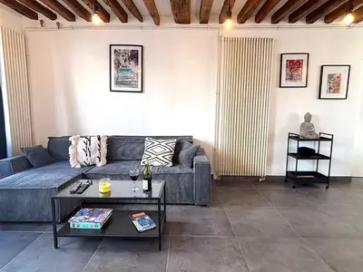 Coin salon dans l'établissement Le Loft Gravilliers