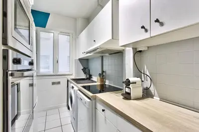 Cuisine ou kitchenette dans l'établissement Appartement Chérioux - Welkeys