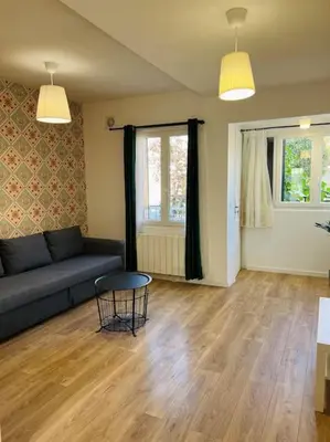 Coin salon dans l'établissement Appart PARIS Sud - calme & lumineux - RER B 2 minutes