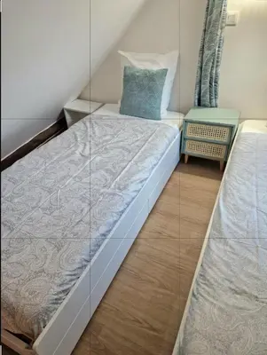 Un ou plusieurs lits dans un hébergement de l'établissement New Inn Paris