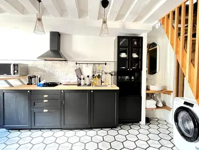 Cuisine ou kitchenette dans l'établissement New Inn Paris