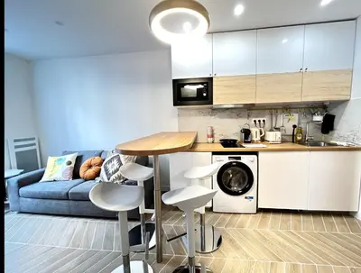 Cuisine ou kitchenette dans l'établissement New Inn Paris