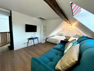 Télévision ou salle de divertissement dans l'établissement New Inn Paris
