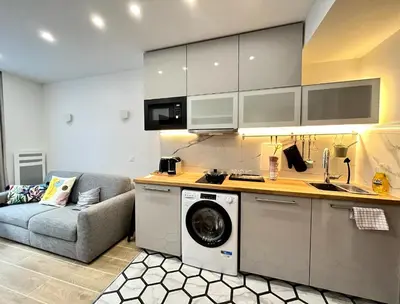 Cuisine ou kitchenette dans l'établissement New Inn Paris