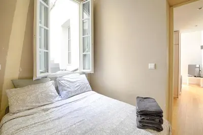 Un ou plusieurs lits dans un hébergement de l'établissement Servandoni - Heart of Saint Germain des Prés - Best location
