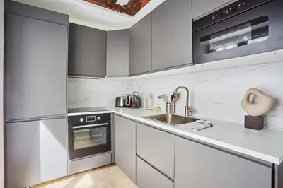Cuisine ou kitchenette dans l'établissement Apartment Louvre Museum by Studio prestige