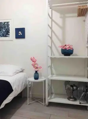 Un ou plusieurs lits dans un hébergement de l'établissement Appartements Au Coeur du Marais