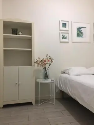 Un ou plusieurs lits dans un hébergement de l'établissement Appartements Au Coeur du Marais