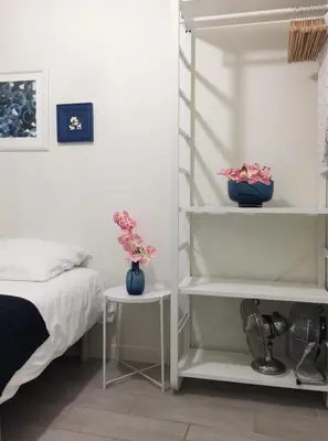 Un ou plusieurs lits dans un hébergement de l'établissement Appartements Au Coeur du Marais