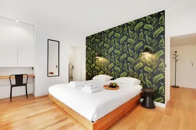 Un ou plusieurs lits dans un hébergement de l'établissement Superbe Appartement - Père Lachaise
