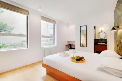 Un ou plusieurs lits dans un hébergement de l'établissement Superbe Appartement - Père Lachaise