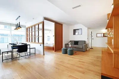Coin salon dans l'établissement Superbe Appartement - Père Lachaise