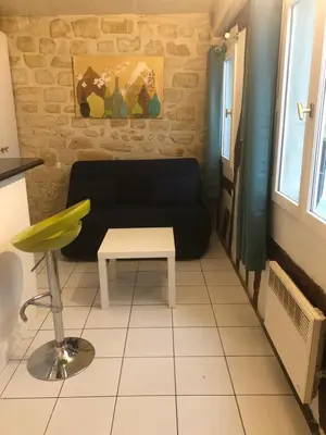 Coin salon dans l'établissement LE TEMPS D'UNE PAUSE