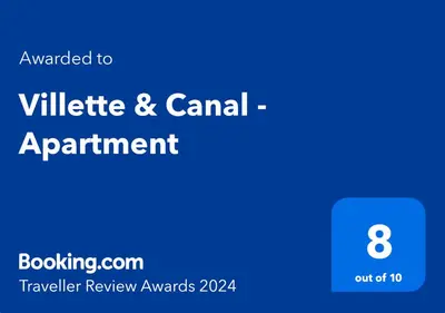 Certificat, récompense, panneau ou autre document affiché dans l'établissement Villette & Canal - Apartment