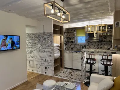 Cuisine ou kitchenette dans l'établissement Villette & Canal - Apartment