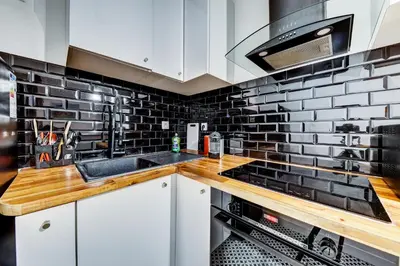 Cuisine ou kitchenette dans l'établissement STUDIO PANTHEON