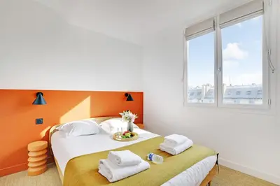 Un ou plusieurs lits dans un hébergement de l'établissement Amazing apartments in Châtelet - Rivoli