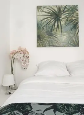 Un ou plusieurs lits dans un hébergement de l'établissement Appartement Familial Au Coeur du Marais