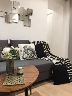 Coin salon dans l'établissement Appartement Familial Au Coeur du Marais