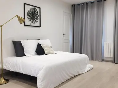 Un ou plusieurs lits dans un hébergement de l'établissement New Apartment in the Heart of Le Marais