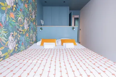 Un ou plusieurs lits dans un hébergement de l'établissement Recently renovated 3BD next to Invalides