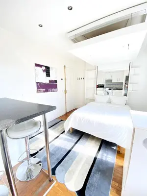 Un ou plusieurs lits dans un hébergement de l'établissement Paris Eiffel Studio