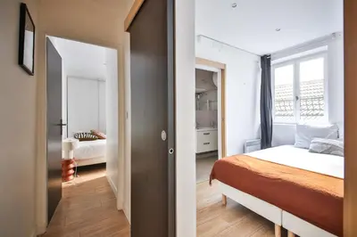 Un ou plusieurs lits dans un hébergement de l'établissement 02#Duplex 2Bedrooms#Sèvres Lecourbe#Necker