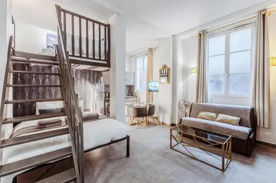 Coin salon dans l'établissement Spacious Loft near Luxembourg Garden