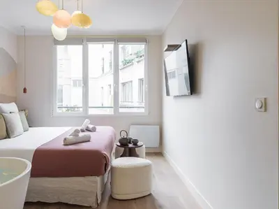 Télévision ou salle de divertissement dans l'établissement Ms Champs Elysées Avenue