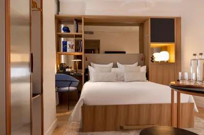 Un ou plusieurs lits dans un hébergement de l'établissement Alberte Hôtel